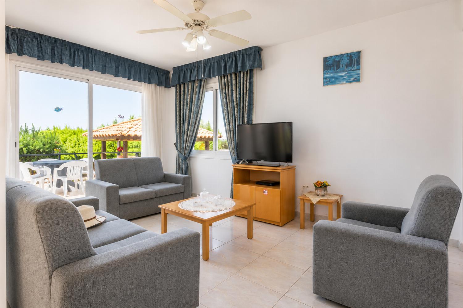 Living room with sofas, WiFi internet, and satellite TV