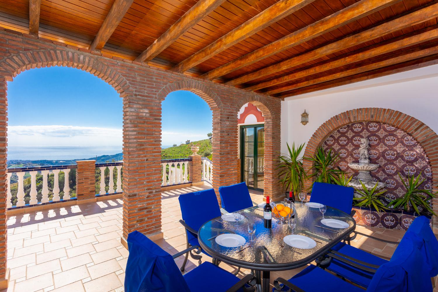 Sheltered terrace area with sea views