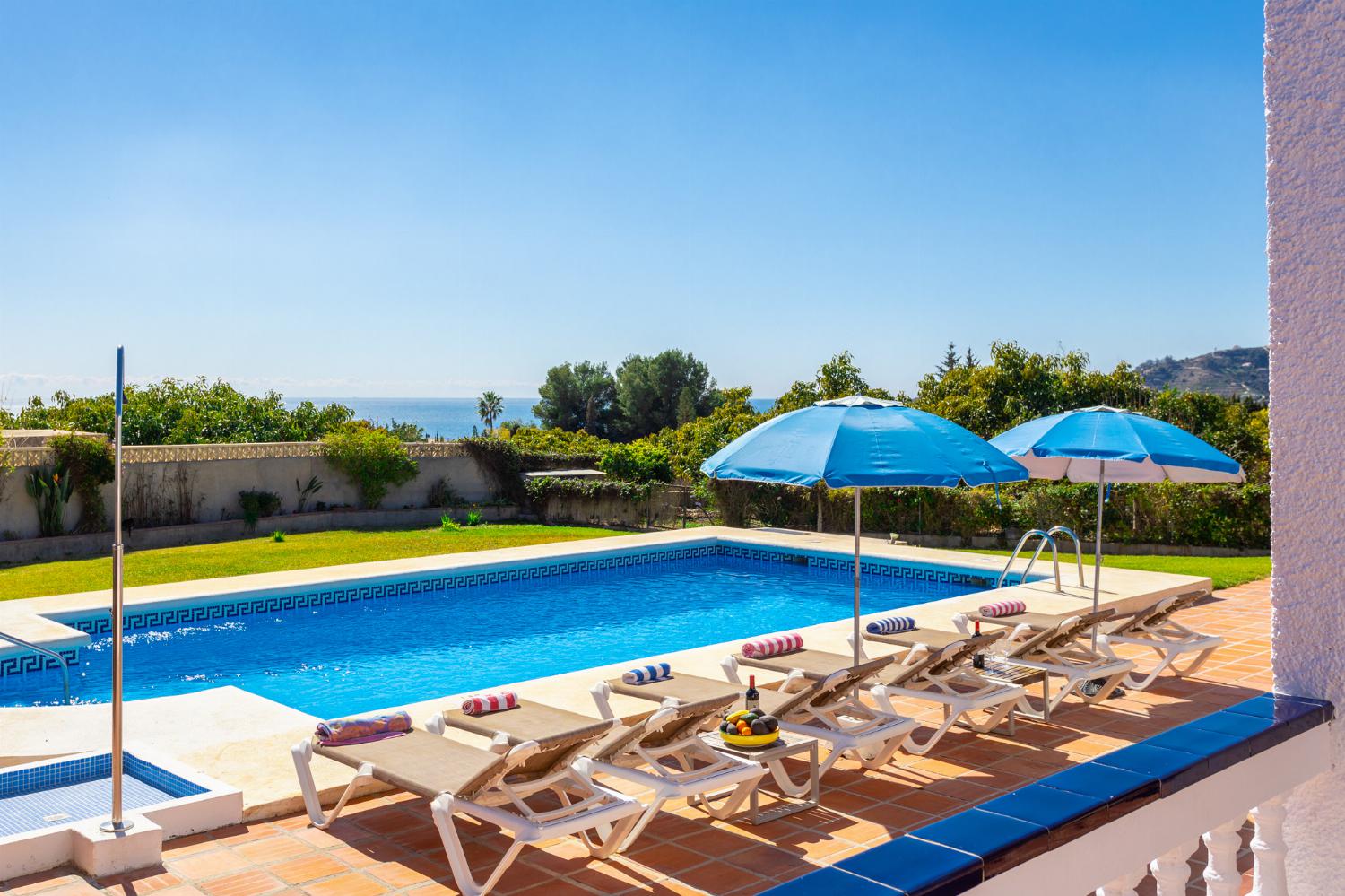 Private pool, terrace, and garden with sea views