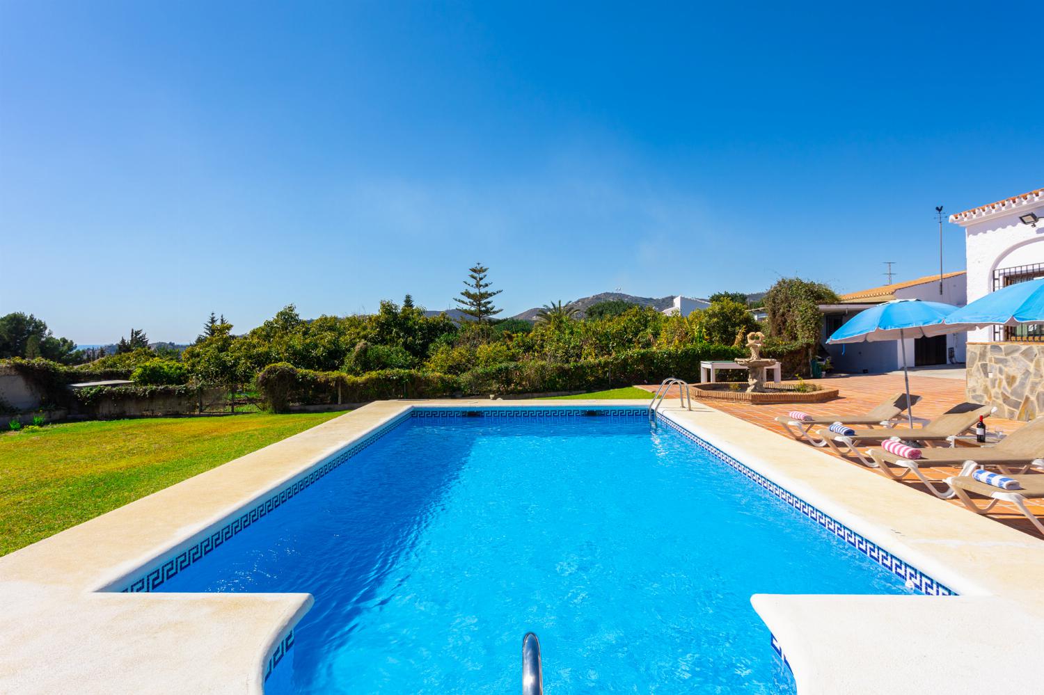 Private pool, terrace, and garden with sea views