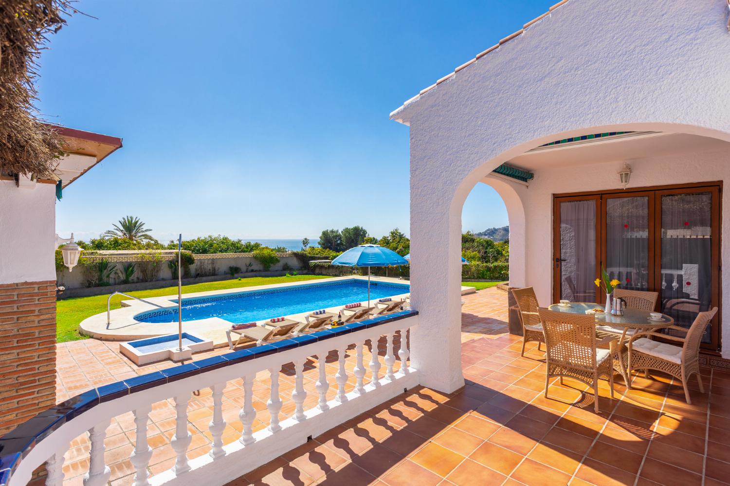 Private pool, terrace, and garden with sea views