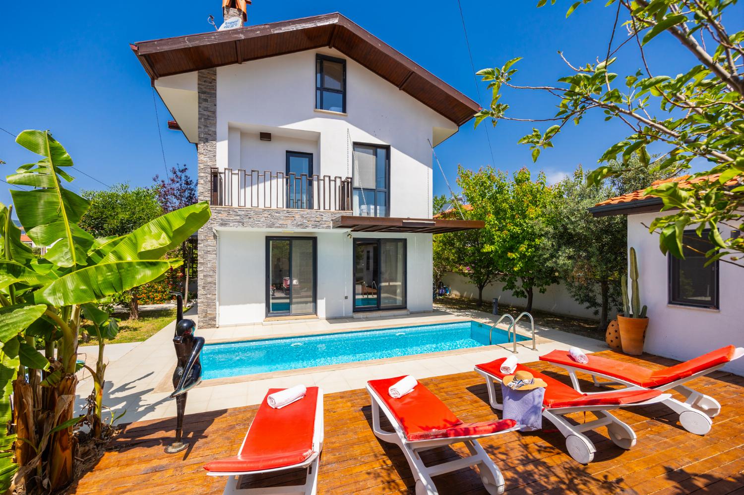 ,Beautiful villa with private pool, terrace, and garden