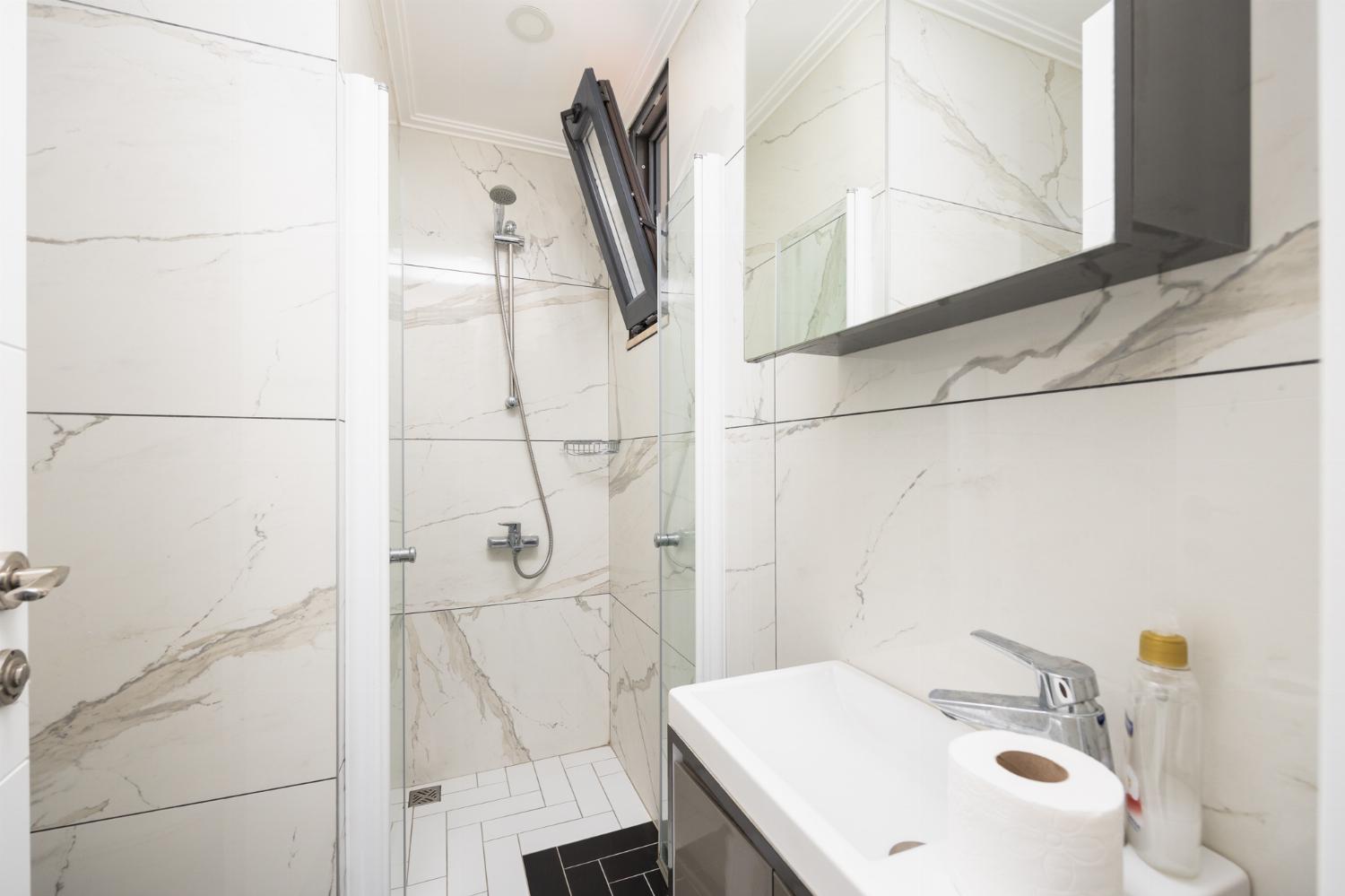 En suite bathroom with shower