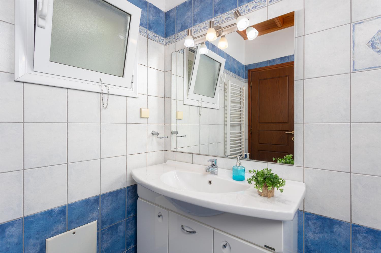 Family bathroom with bath and shower