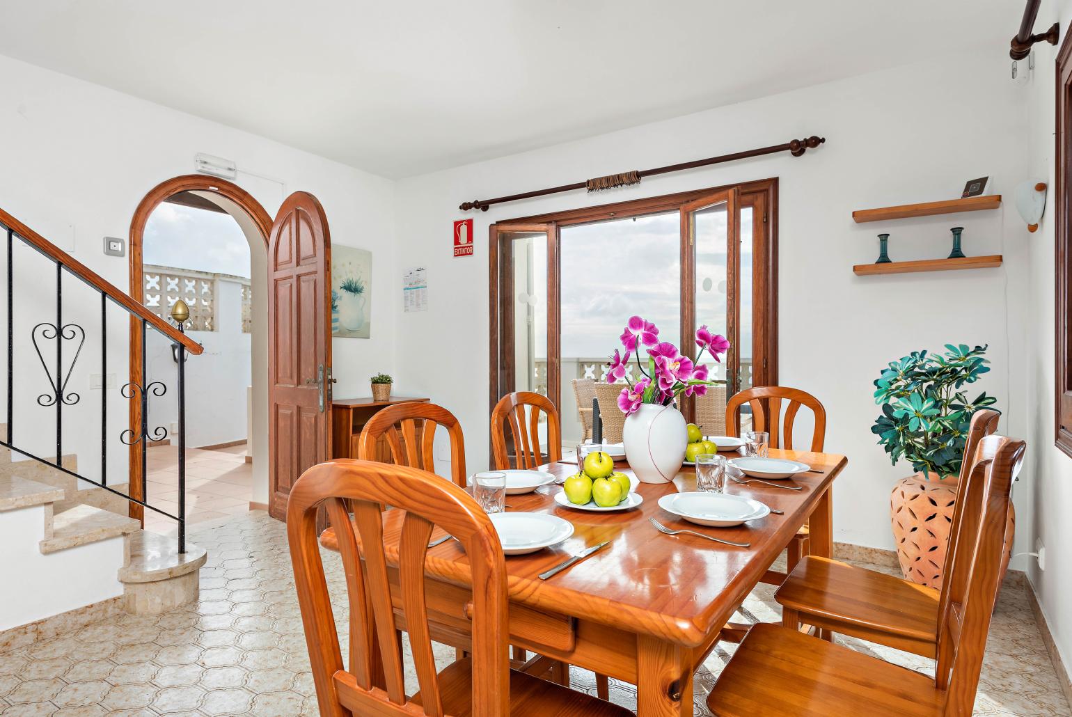 Indoor dining area with terrace access