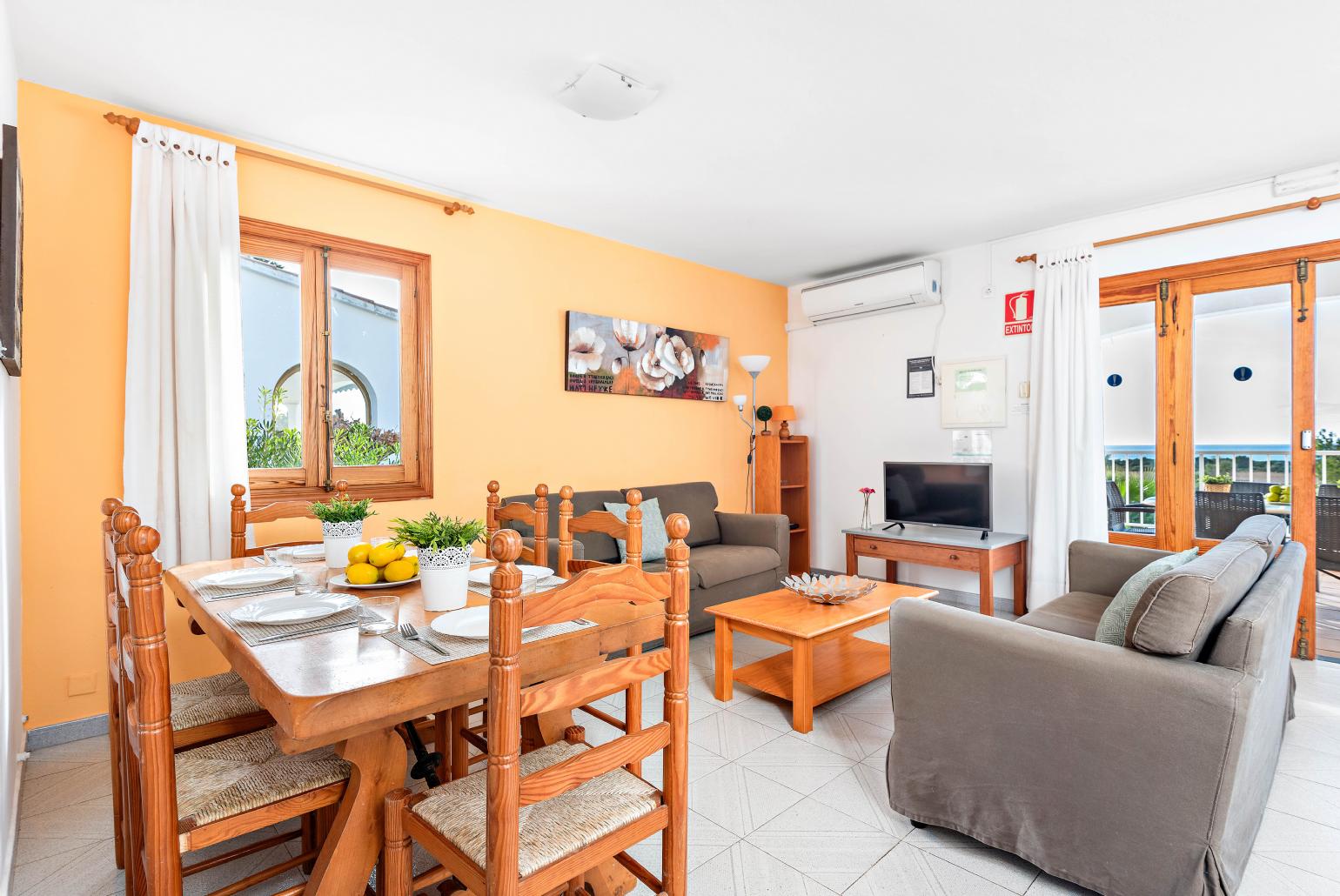 Living room area with indoor dining 