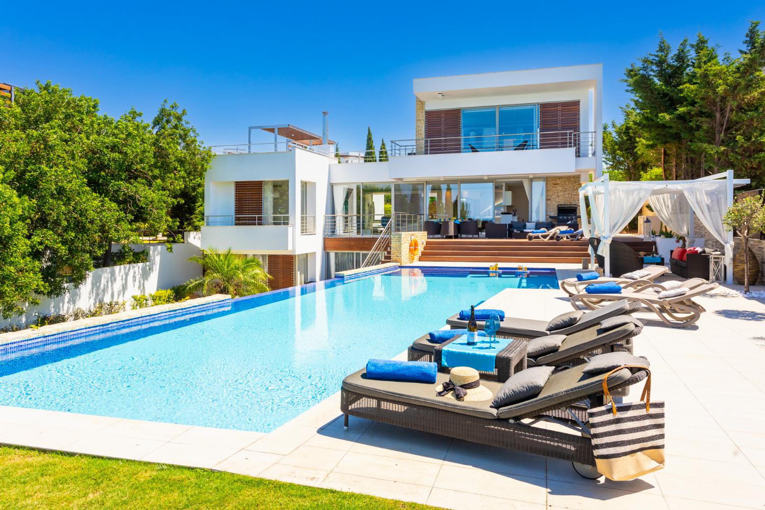 ,Beautiful villa with private pools, terrace, and garden with panoramic sea views