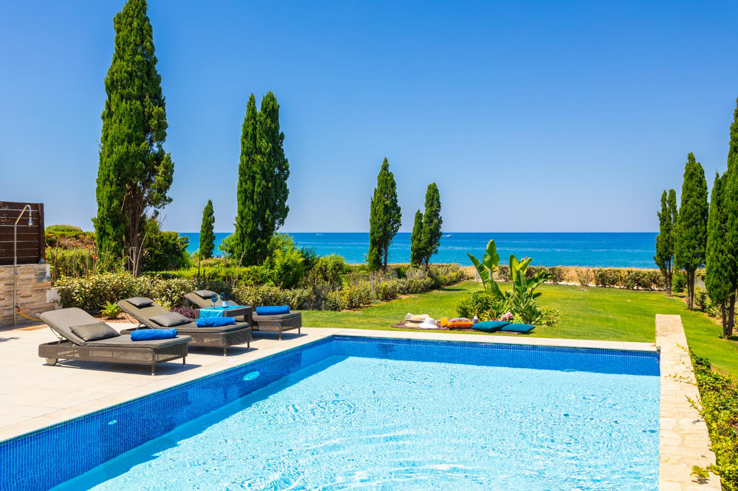 Private pools, terrace, and garden with panoramic sea views
