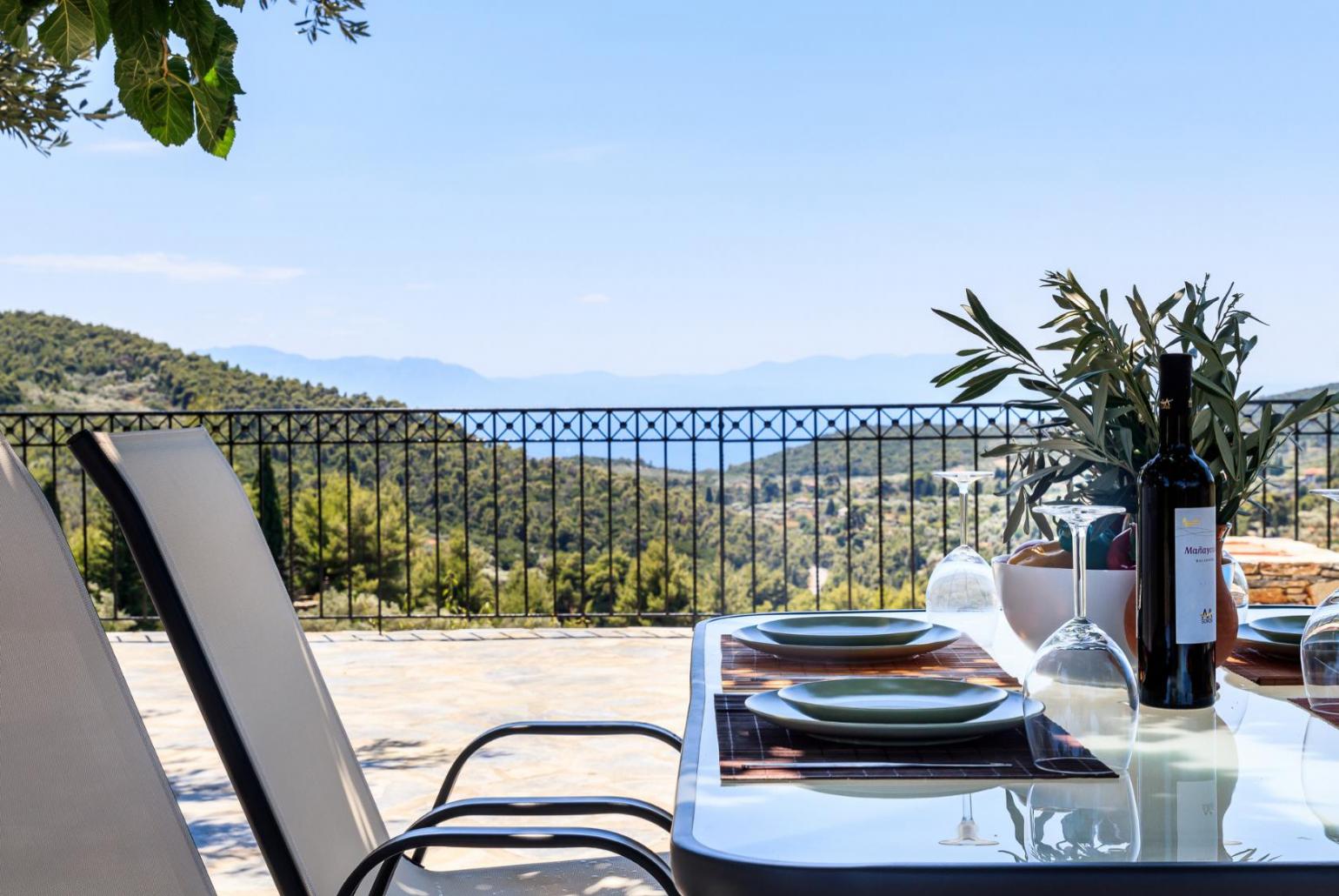 Outdoor dining area with a beautiful sea view