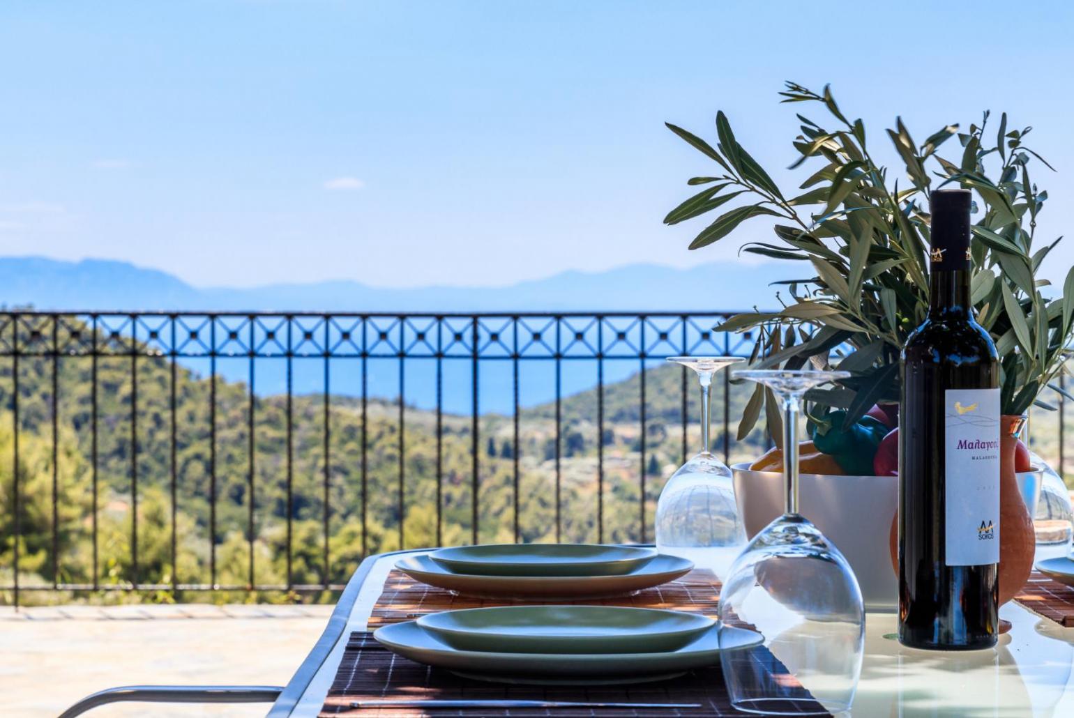 Outdoor dining area with a beautiful sea view