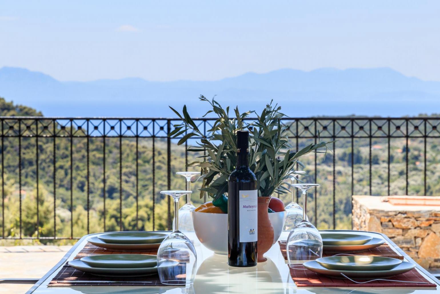 Outdoor dining area with a beautiful sea view