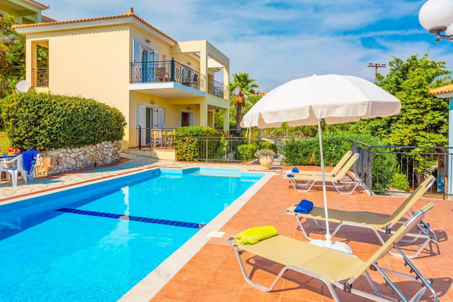 Pool and terrace area with a panoramic sea view