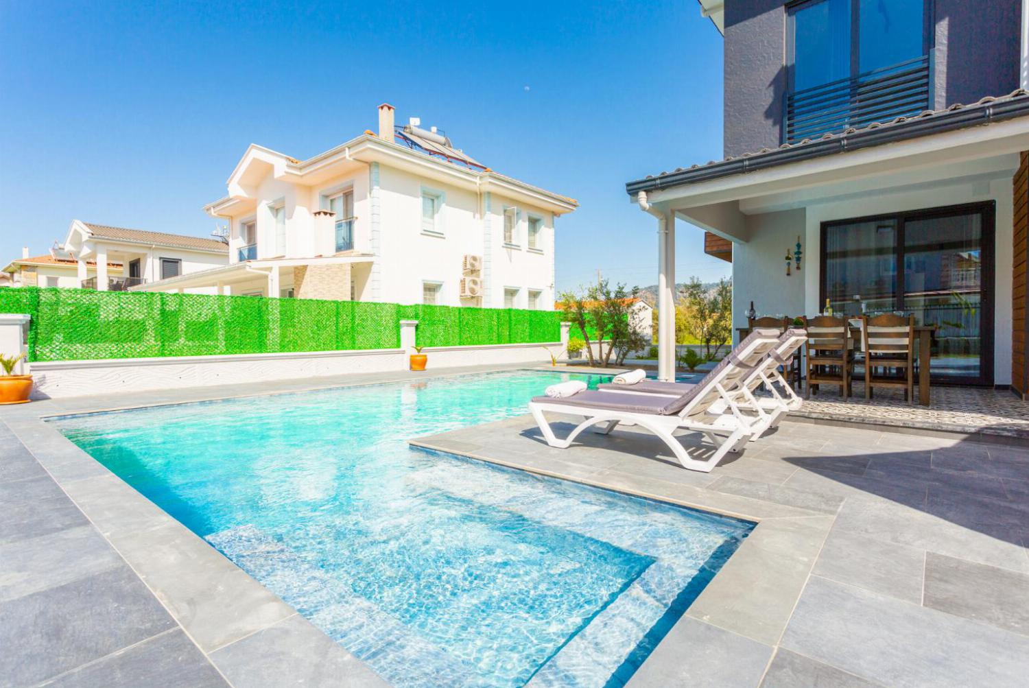 Private pool, terrace, and outdoor dining area