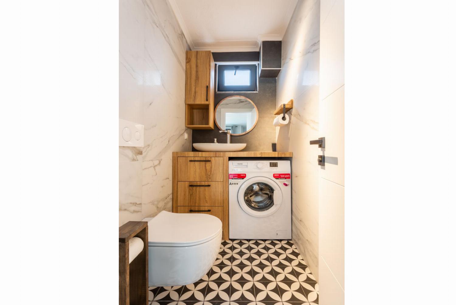 Guest Washroom with W/C, and washing machine