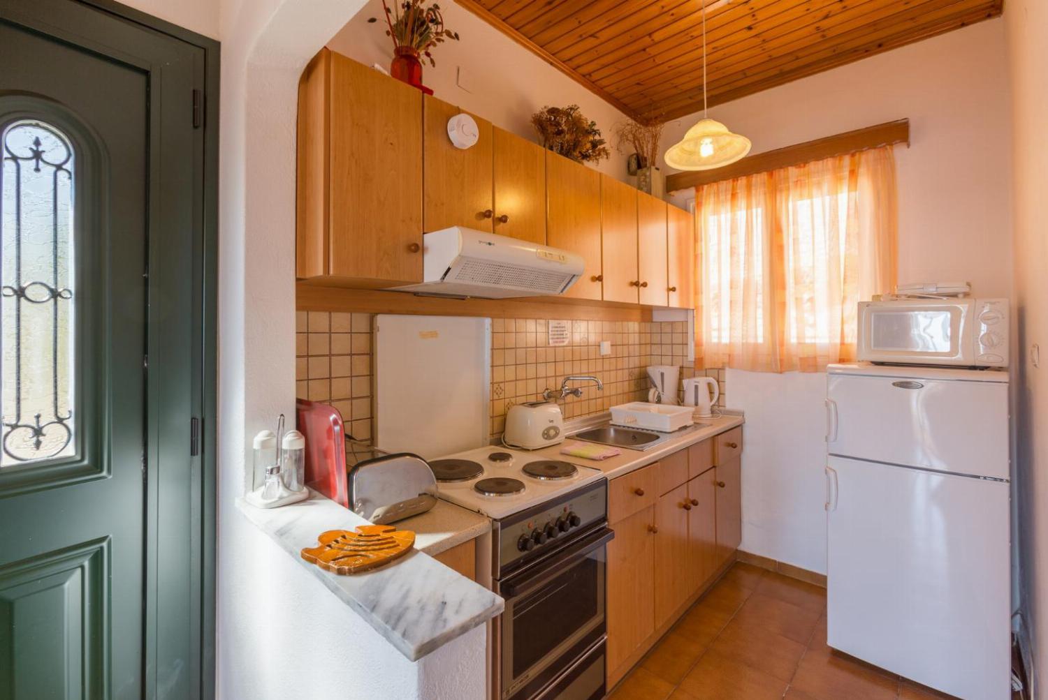 Equipped kitchen and dining area