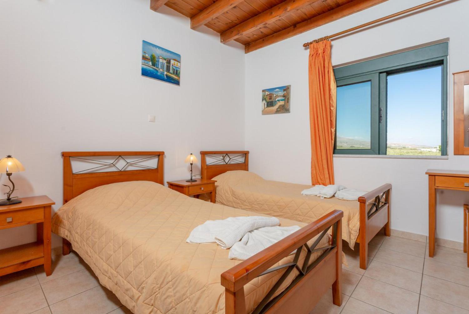 Twin bedroom with A/C and balcony access with sea views