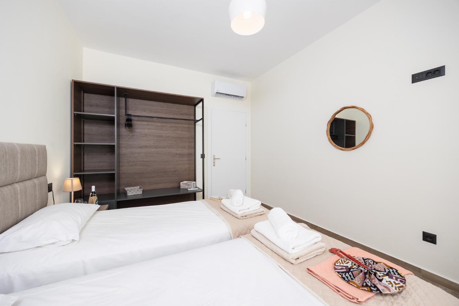 Twin bedroom with A/C