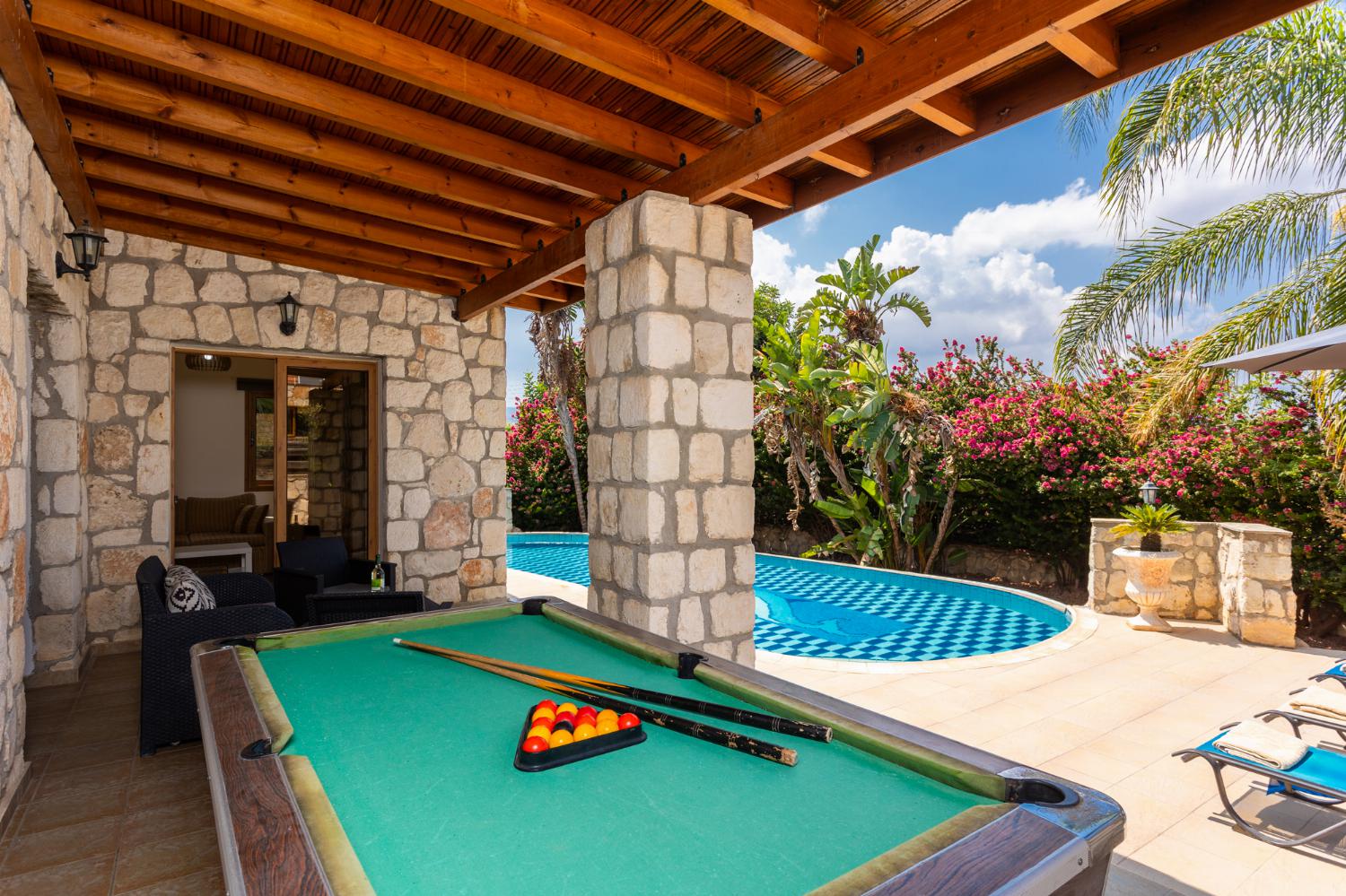 Sheltered terrace area with pool table 