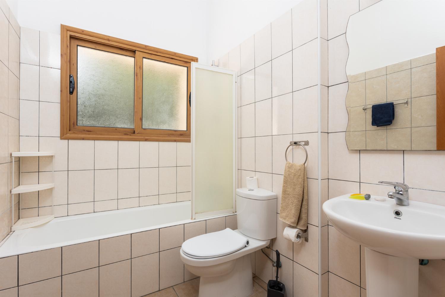 Family bathroom with bath and shower