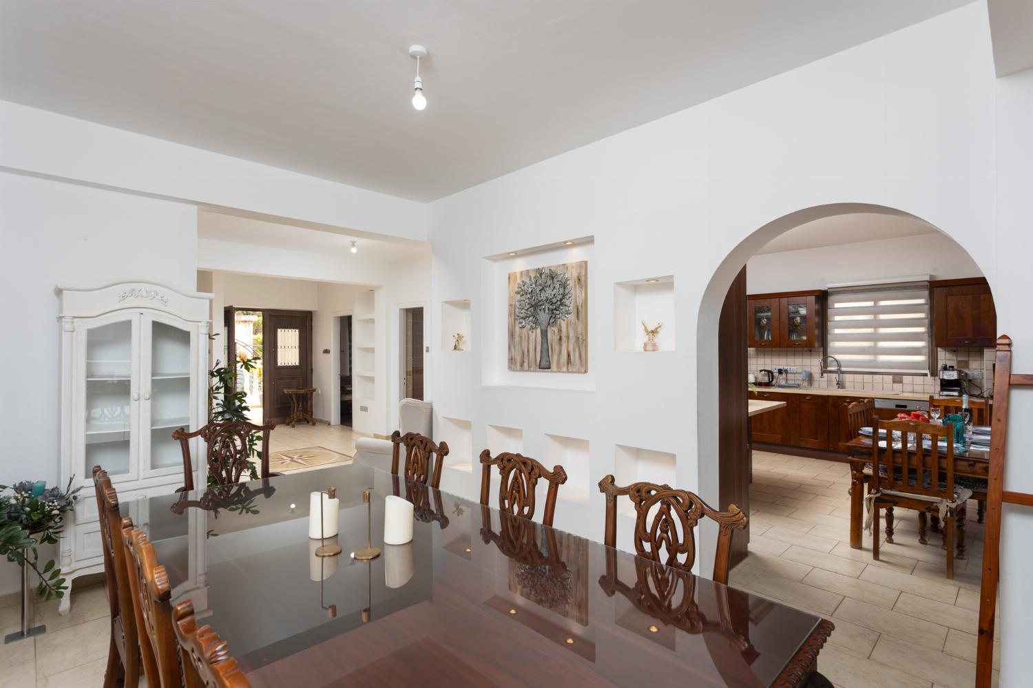 Main building: living room with sofas, dining area, A/C, WiFi internet, and sea views