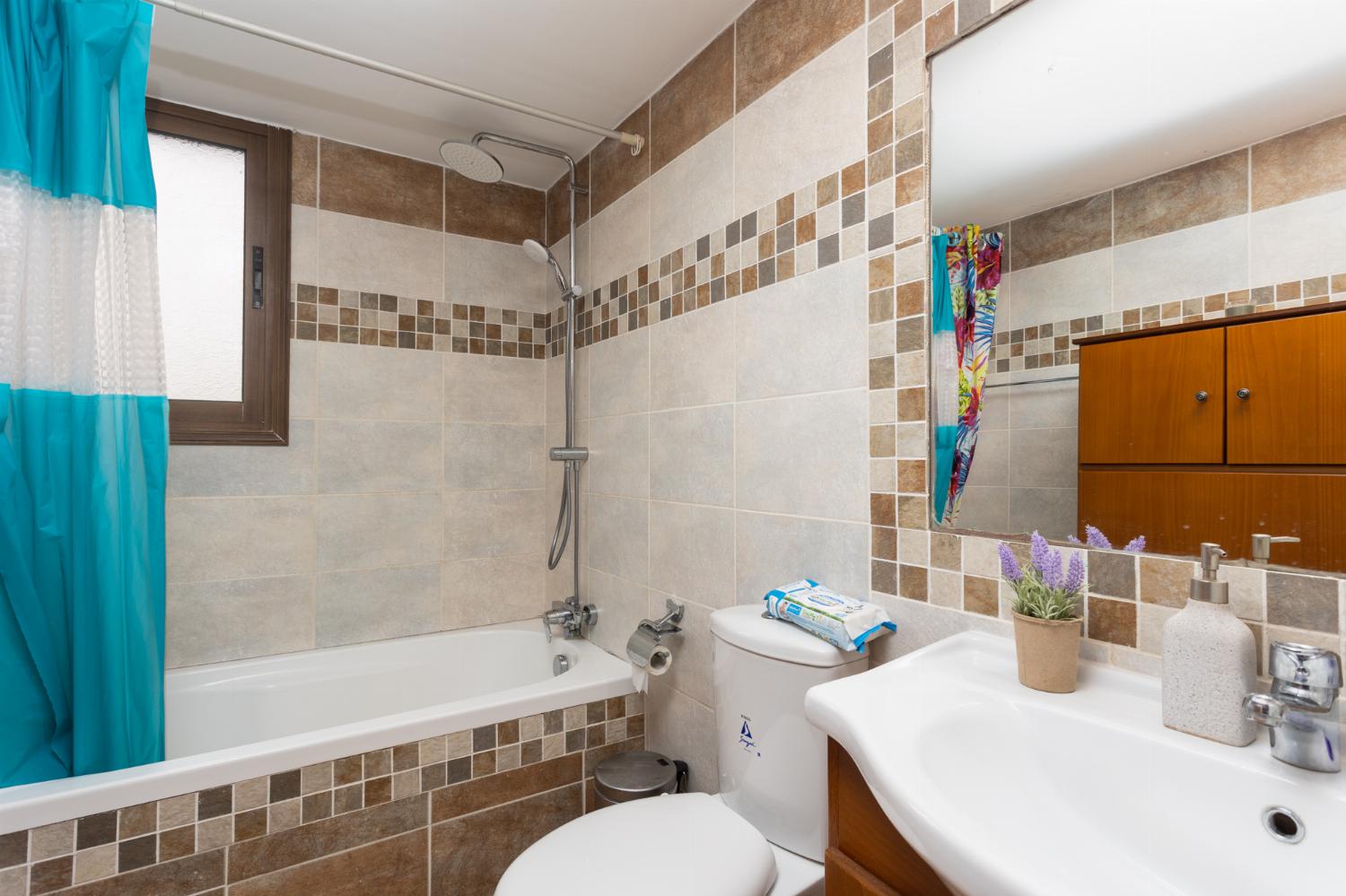 Main building: family bathroom with bath and shower