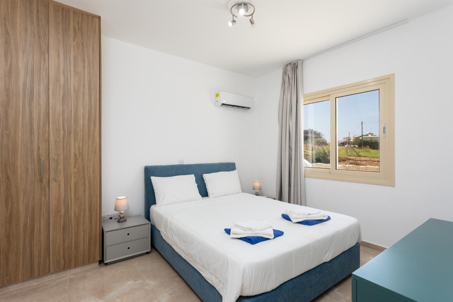 Double bedroom with en suite bathroom and A/C
