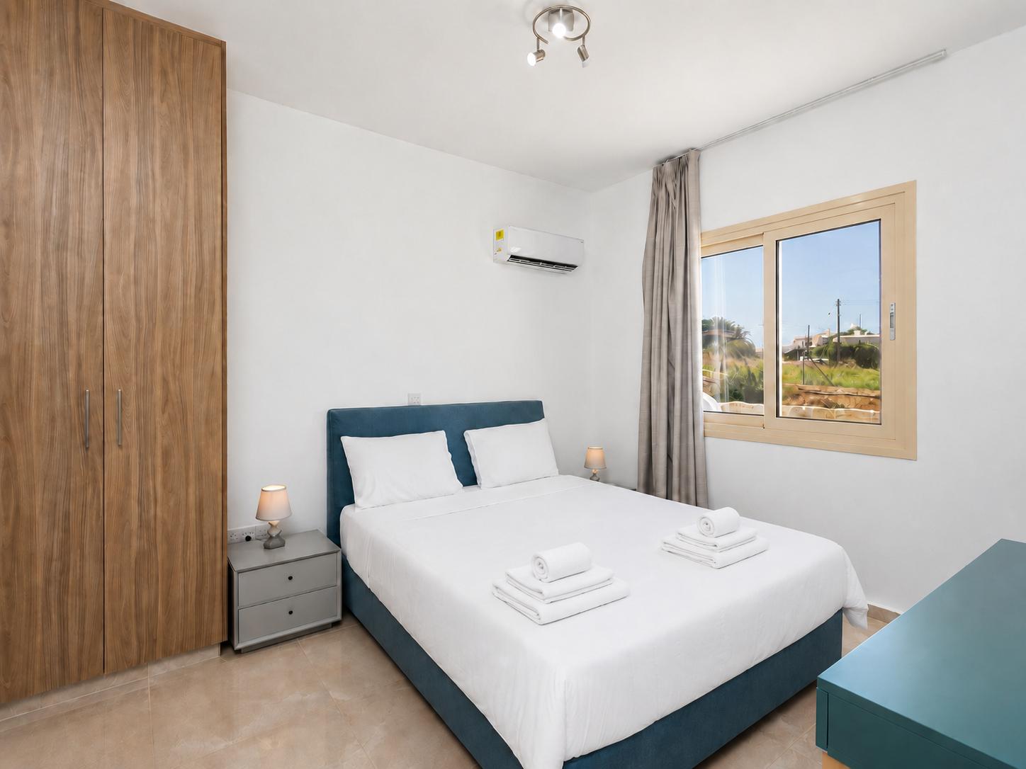 Double bedroom with en suite bathroom and A/C