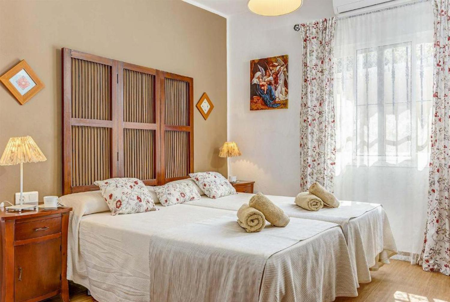 Double bed bedroom with A/C, En suite bathroom