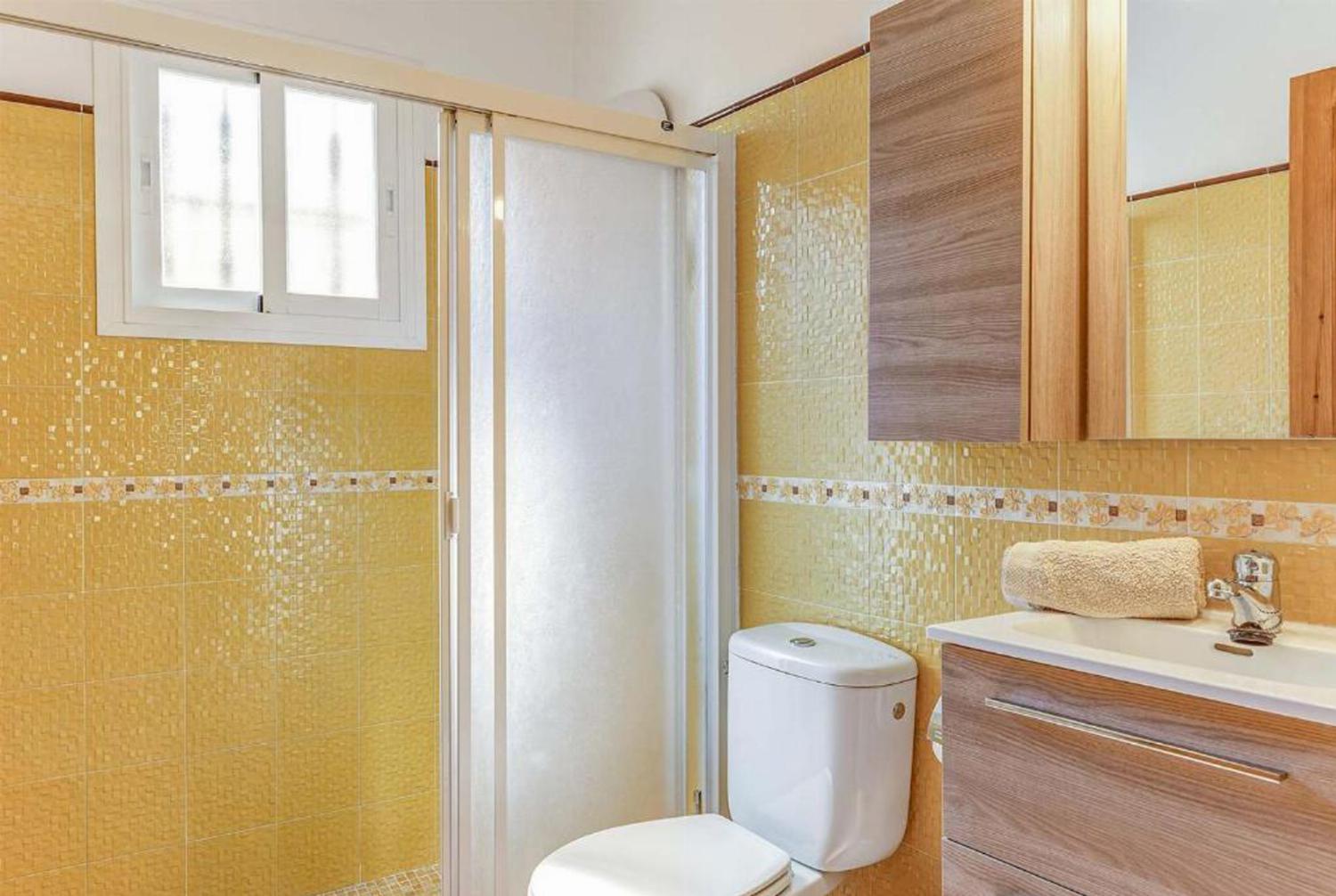 Family bathroom with shower and WC