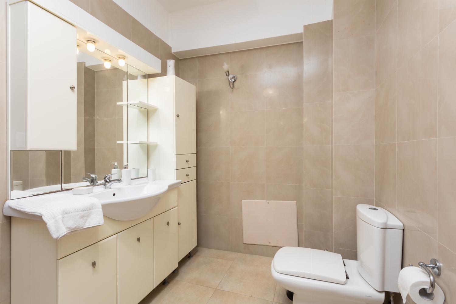 Family bathroom with bath and shower