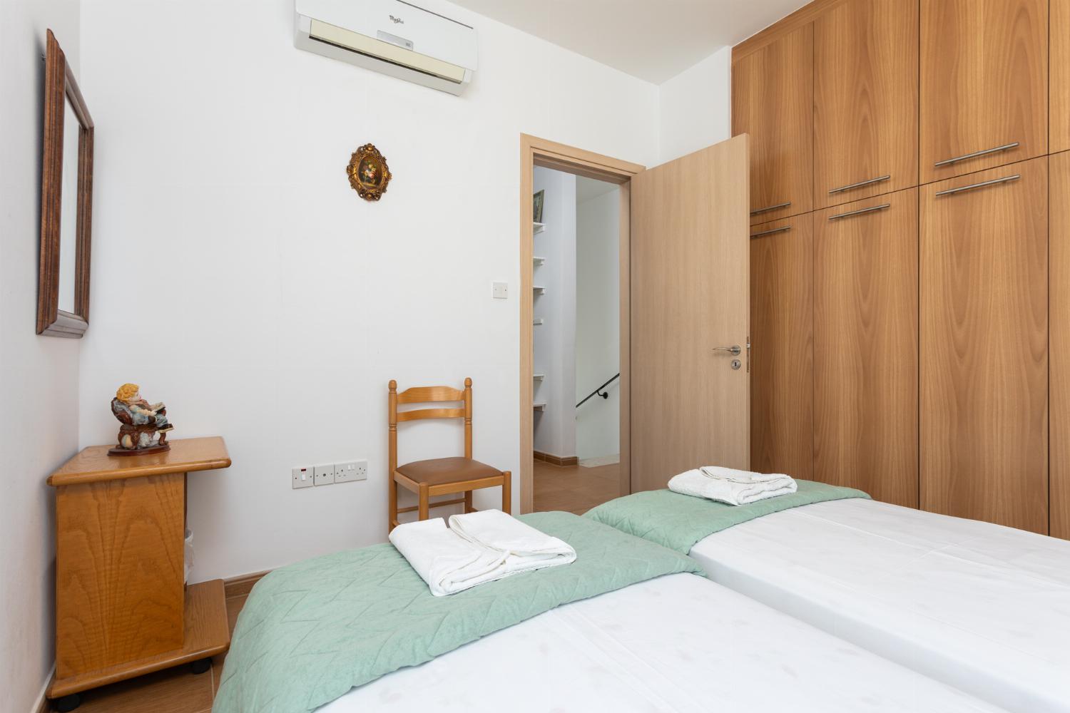 Twin bedroom with A/C