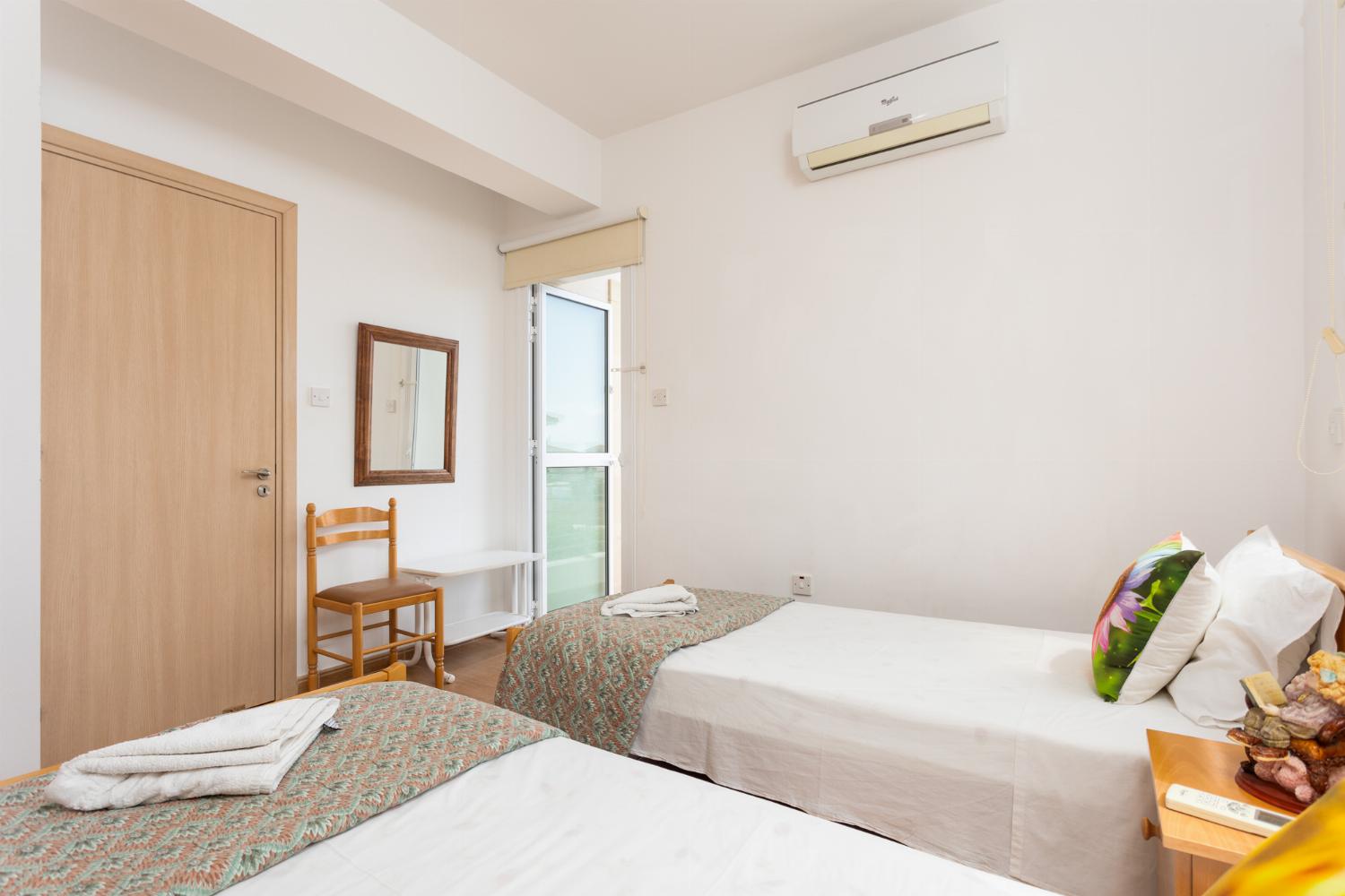 Twin bedroom with A/C