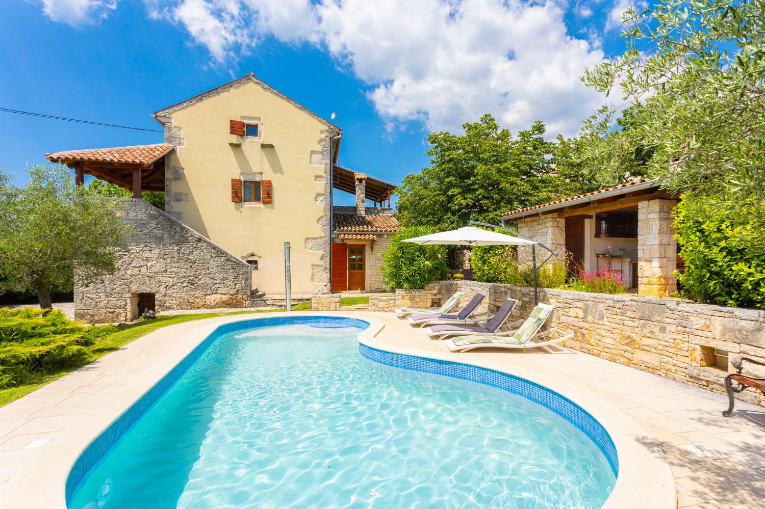 ,Beautiful villa with private pool, terraces, and garden