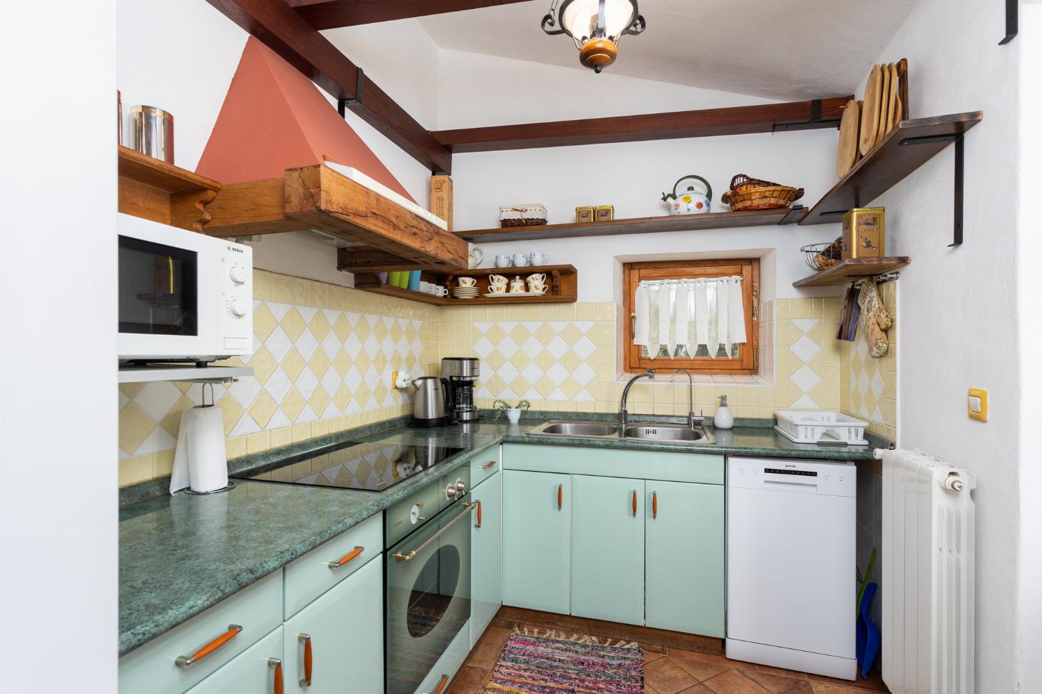 Equipped kitchen on ground floor
