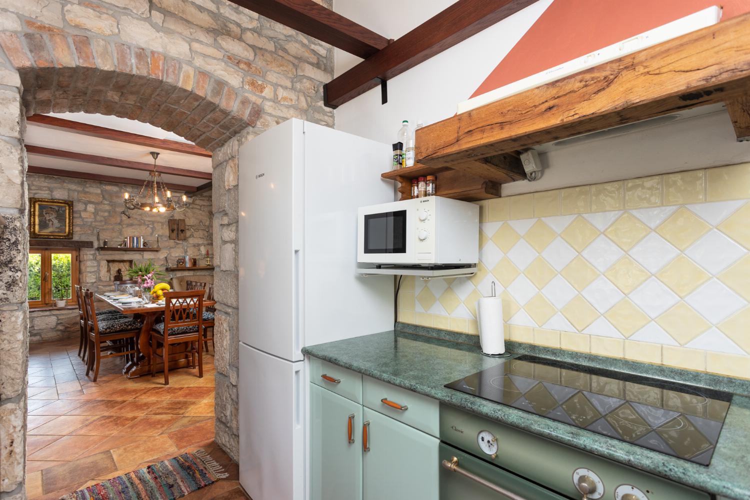 Equipped kitchen on ground floor