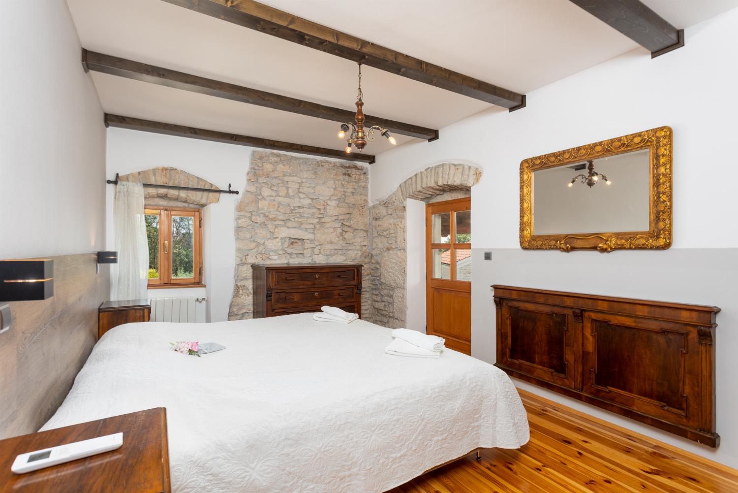 Double bedroom on first floor with A/C and terrace access