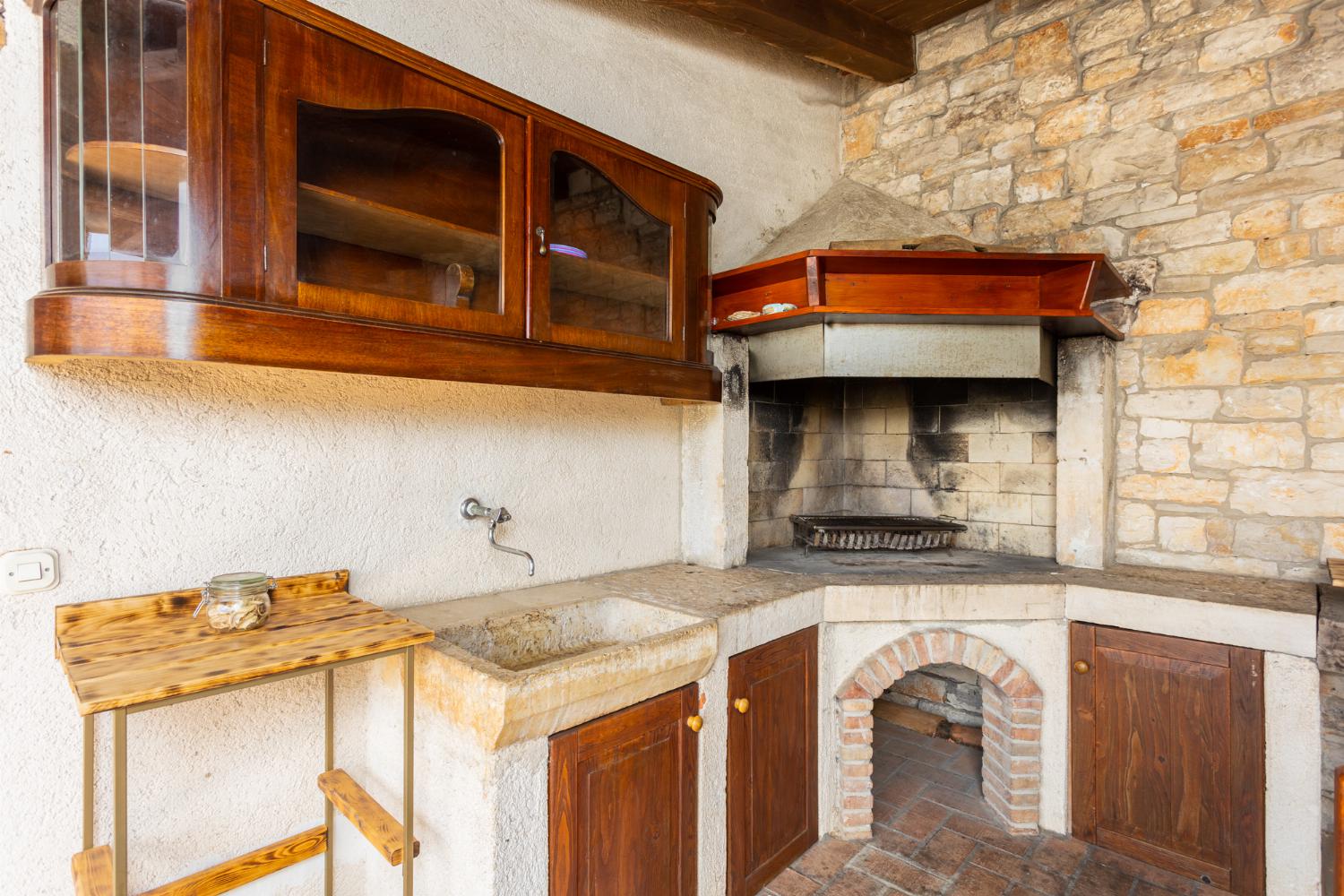 Sheltered terrace area with BBQ