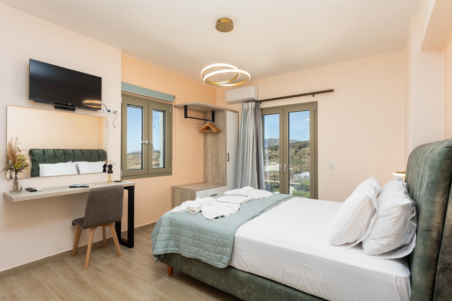 Double bedroom with en suite bathroom and A/C