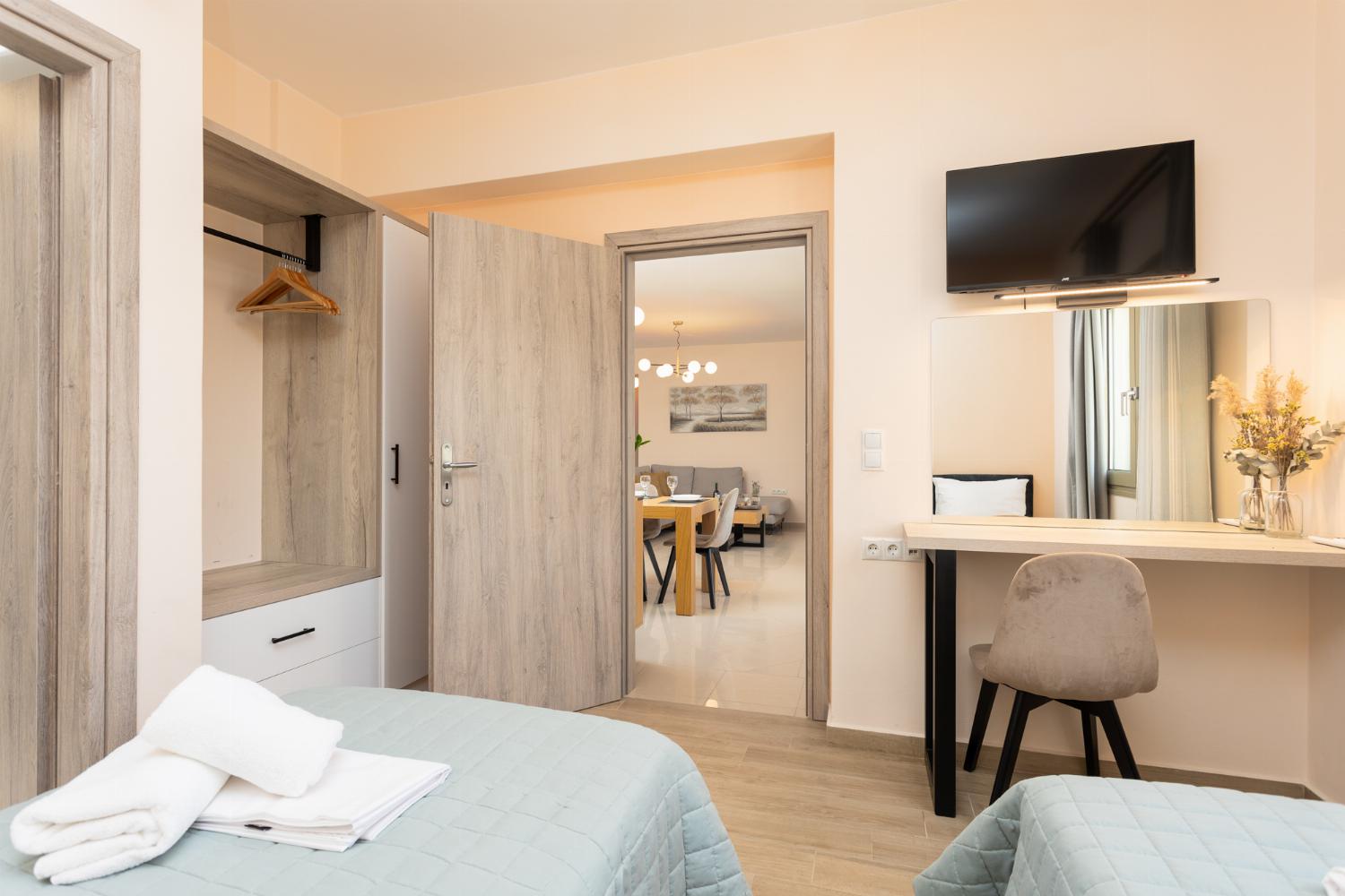 Twin bedroom with en suite bathroom and A/C