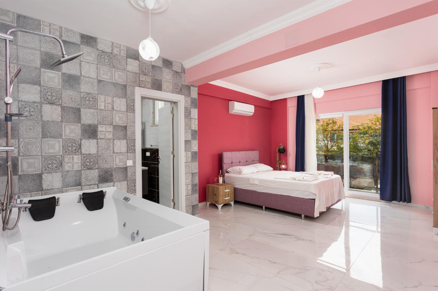 Double bedroom with en suite bathroom and A/C