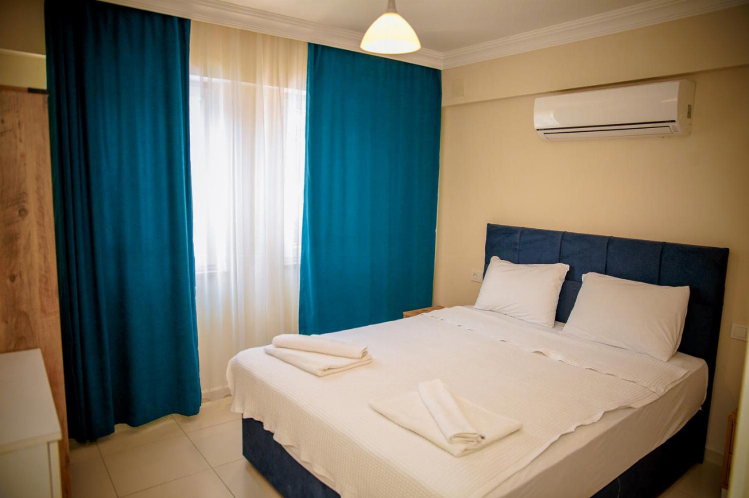 Double bed bedroom with A/C and en suite bathroom
