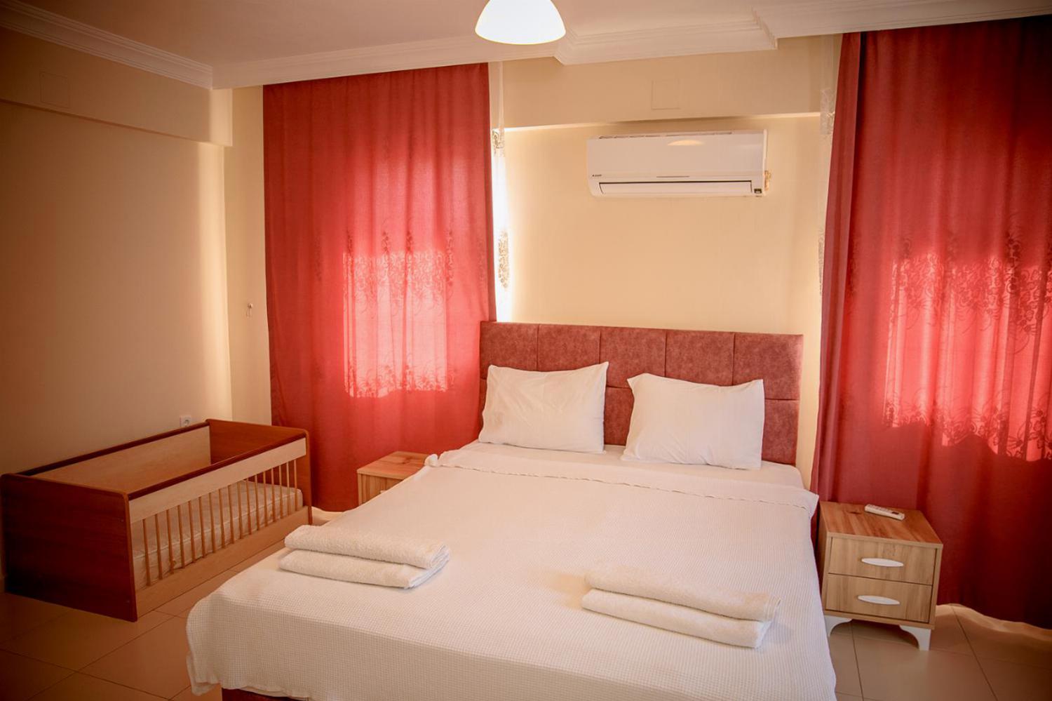 Double bed bedroom with A/C and en suite bathroom