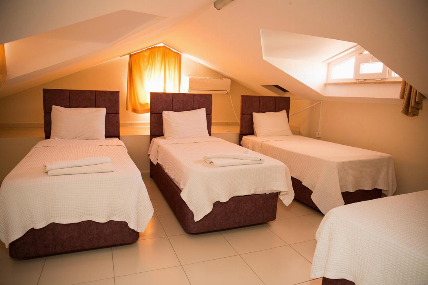 single beds bedroom with A/C
