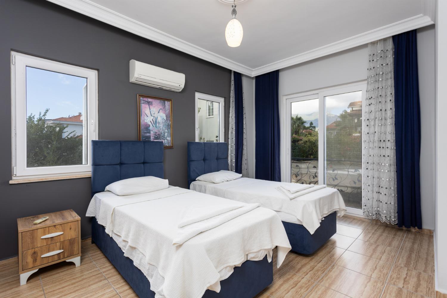 Twin bedroom with A/C