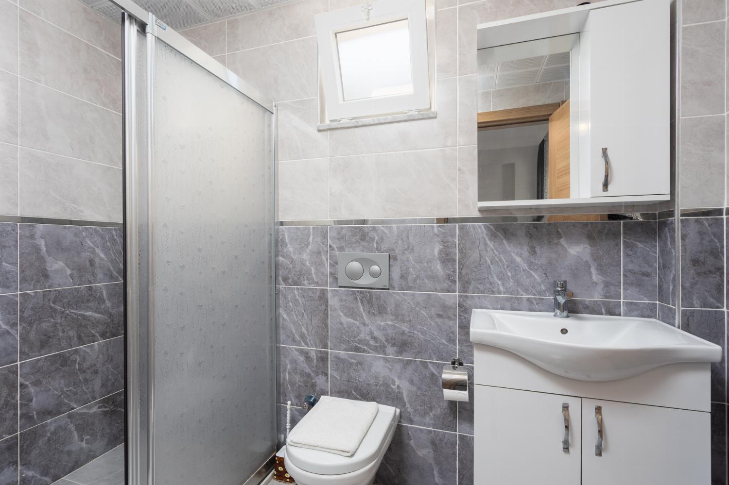 En suite bathroom with shower