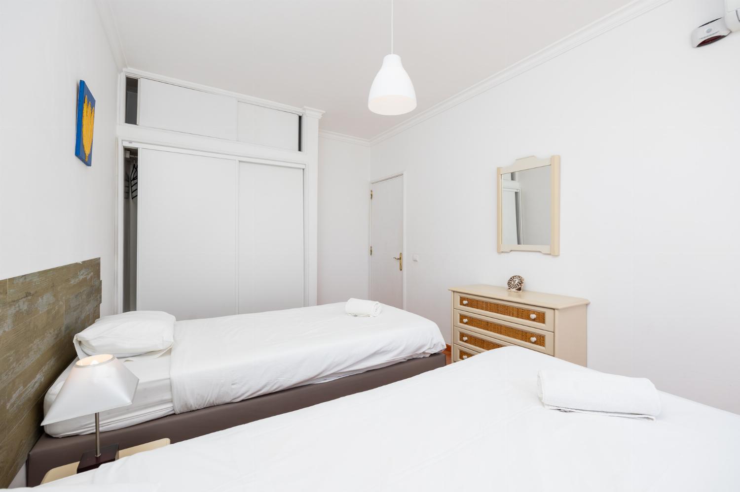 Twin bedroom with A/C