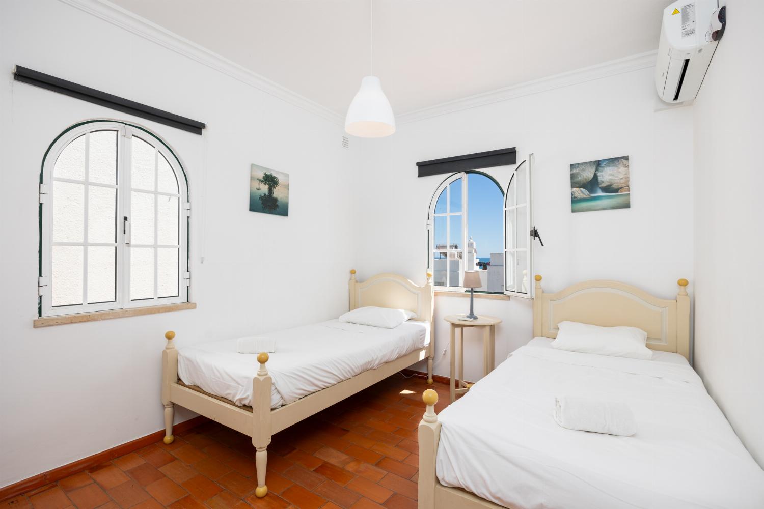 Twin bedroom with A/C