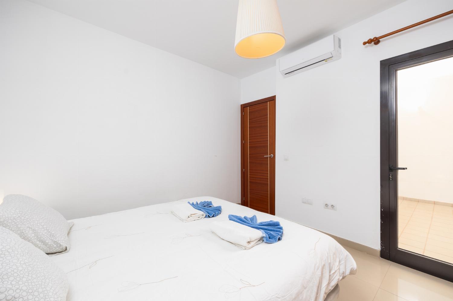 Double bedroom with en suite bathroom and A/C