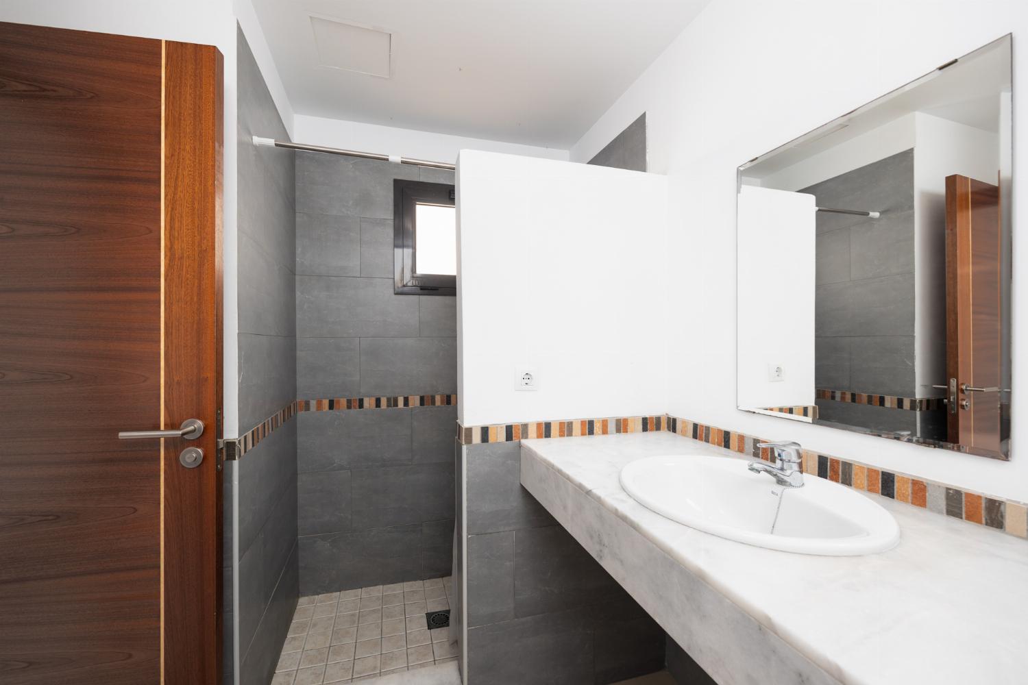 En suite bathroom with shower