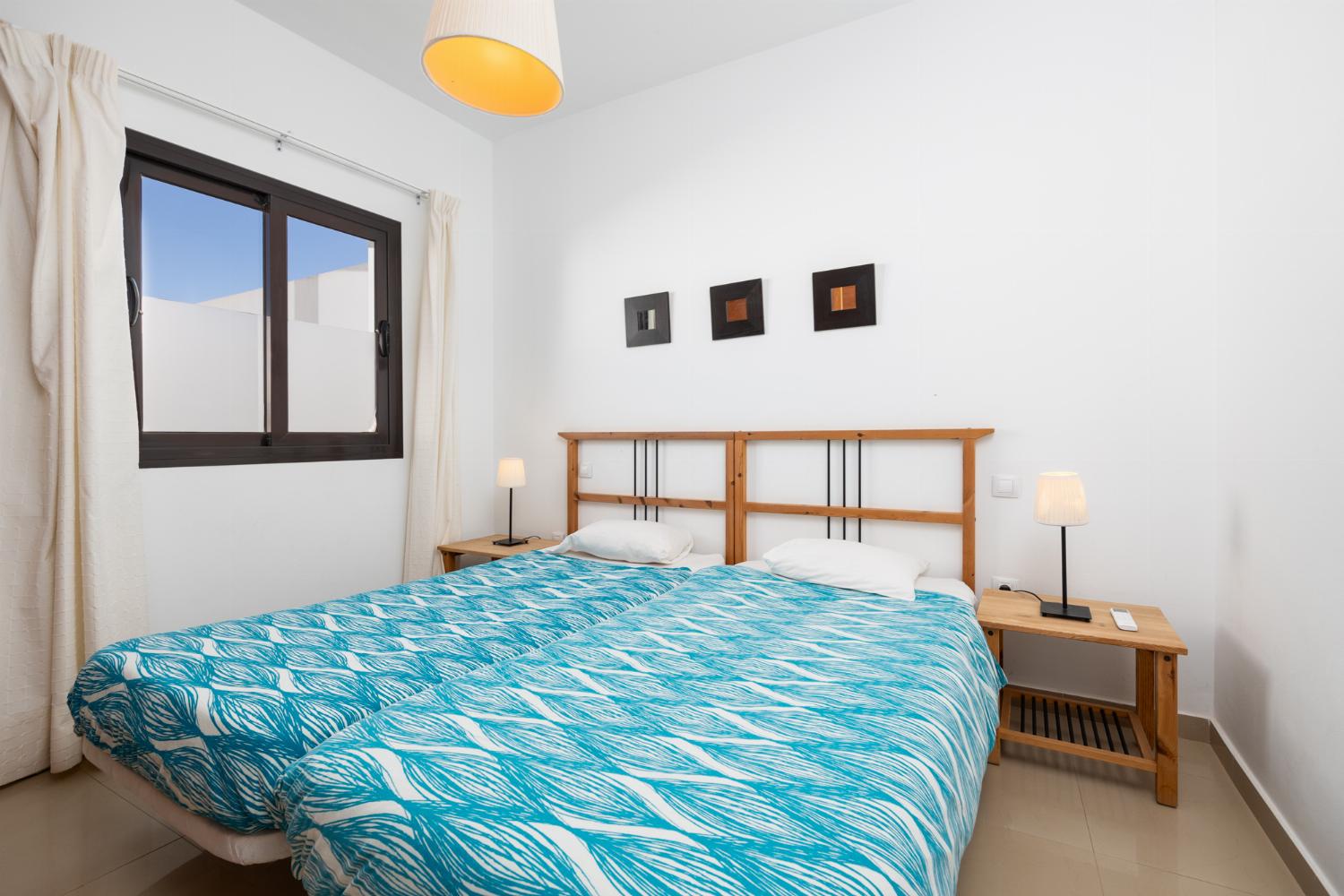 Twin bedroom with A/C